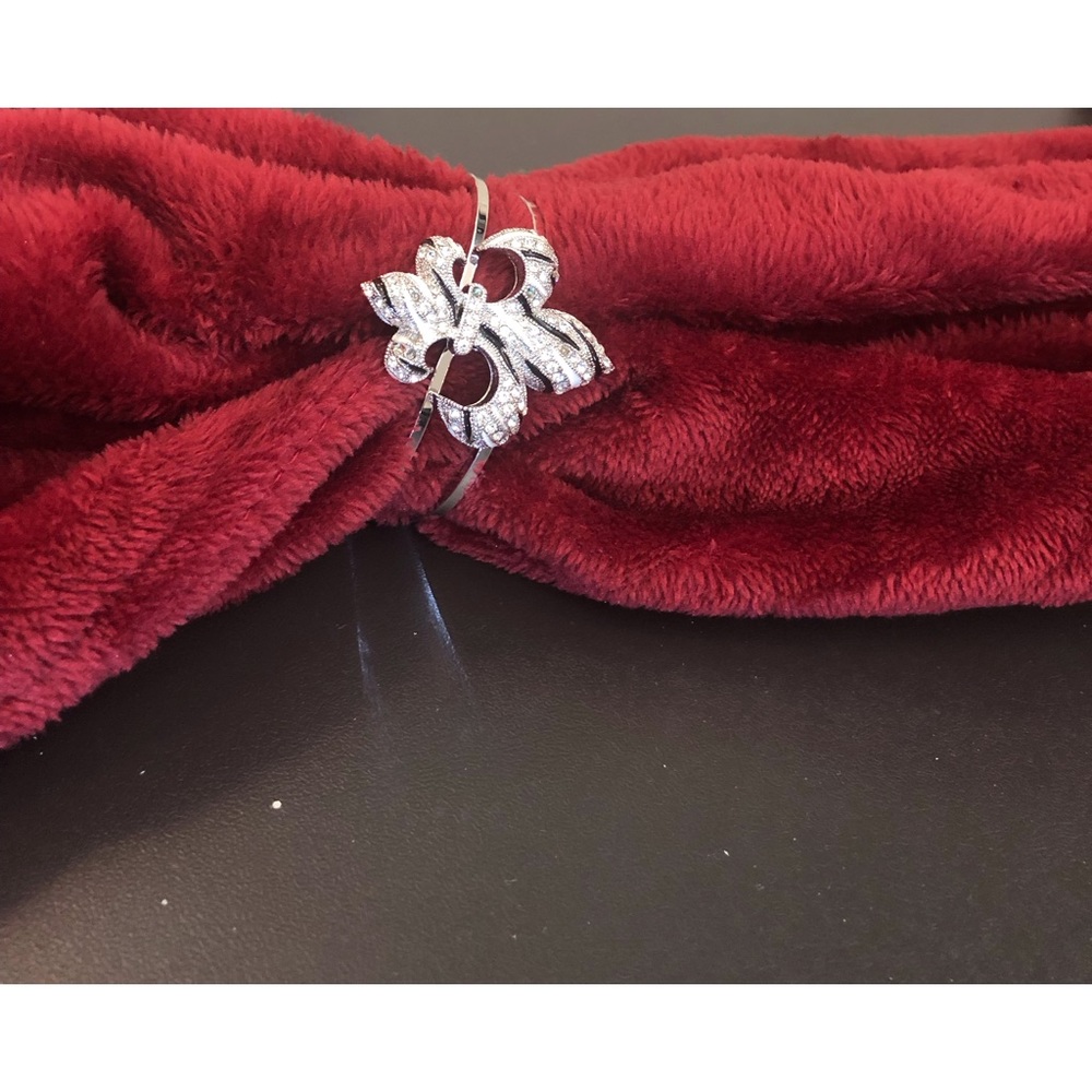 Fleur-de-lis’s black, white and silver bangle bracelet
